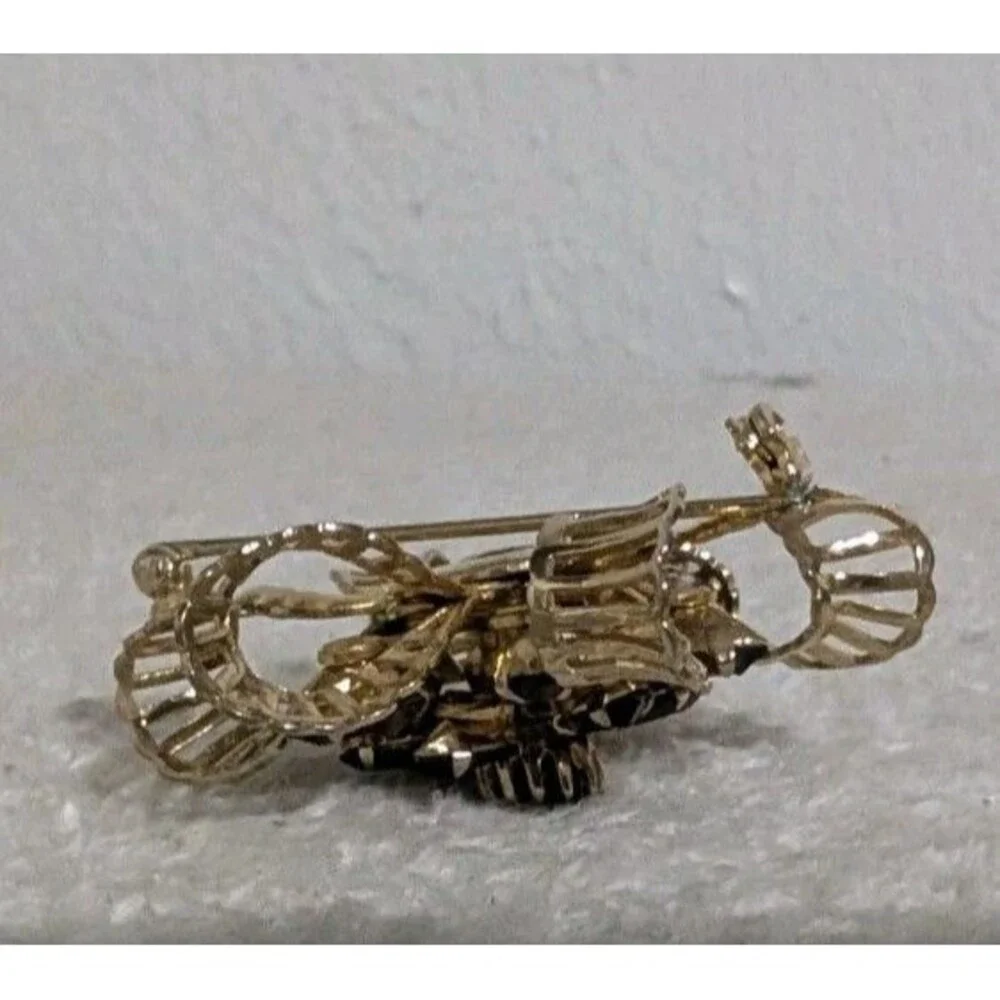 Purple Rhinestone Gold Tone Floral Brooch Signed KRAMER OF NEW YORK Vintage Pin